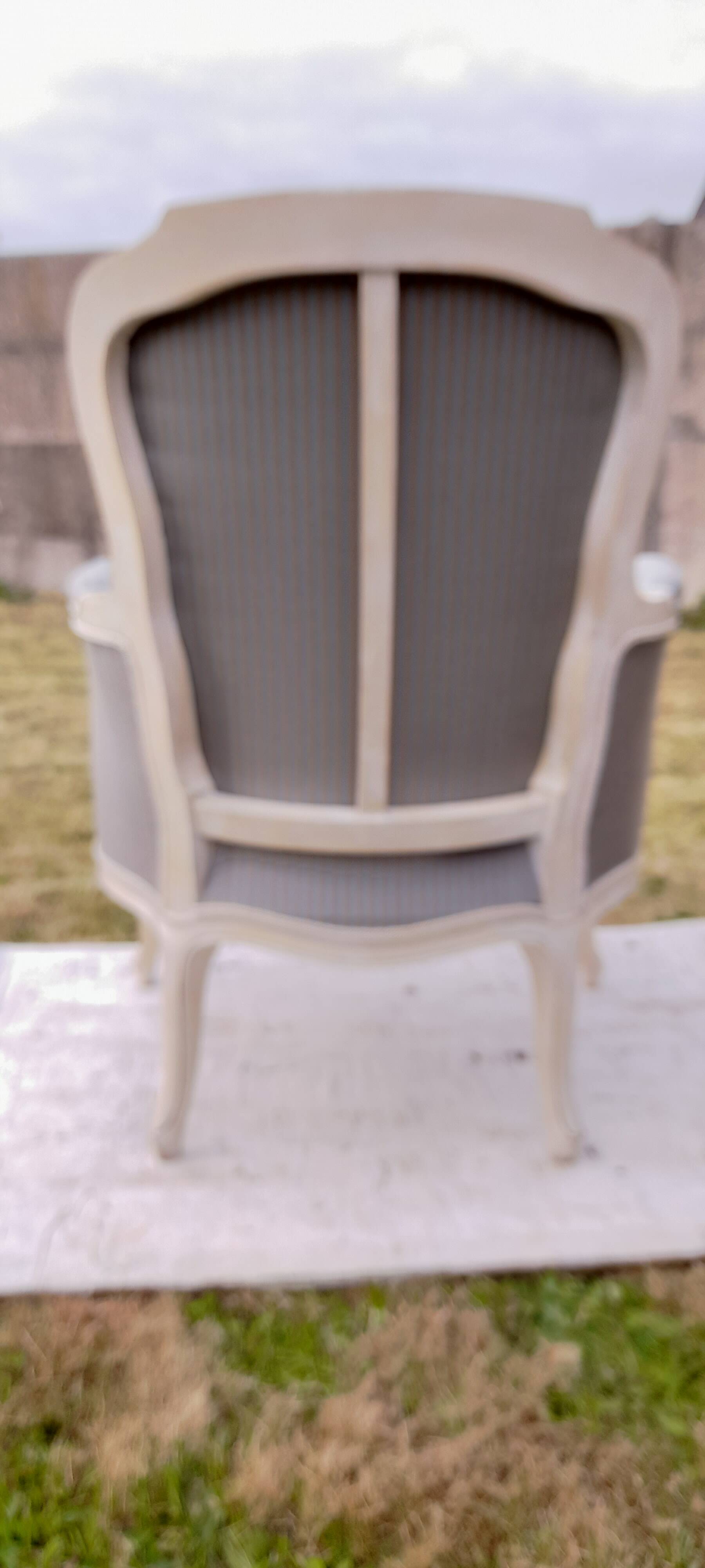 Bergère armchair with blue striped seat and back