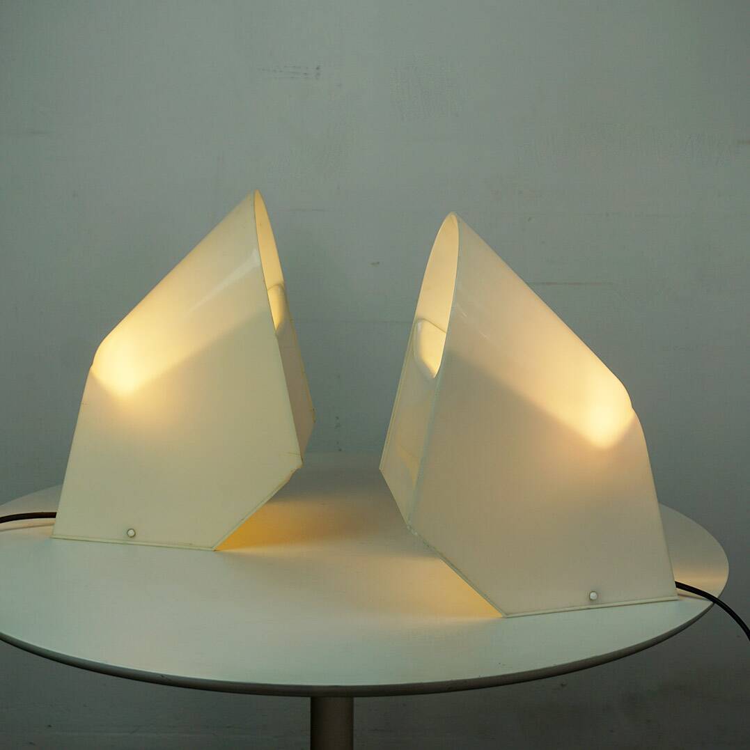 A pair of white plastic table lamps by Cini Boeri for Stilnovo, Italy.