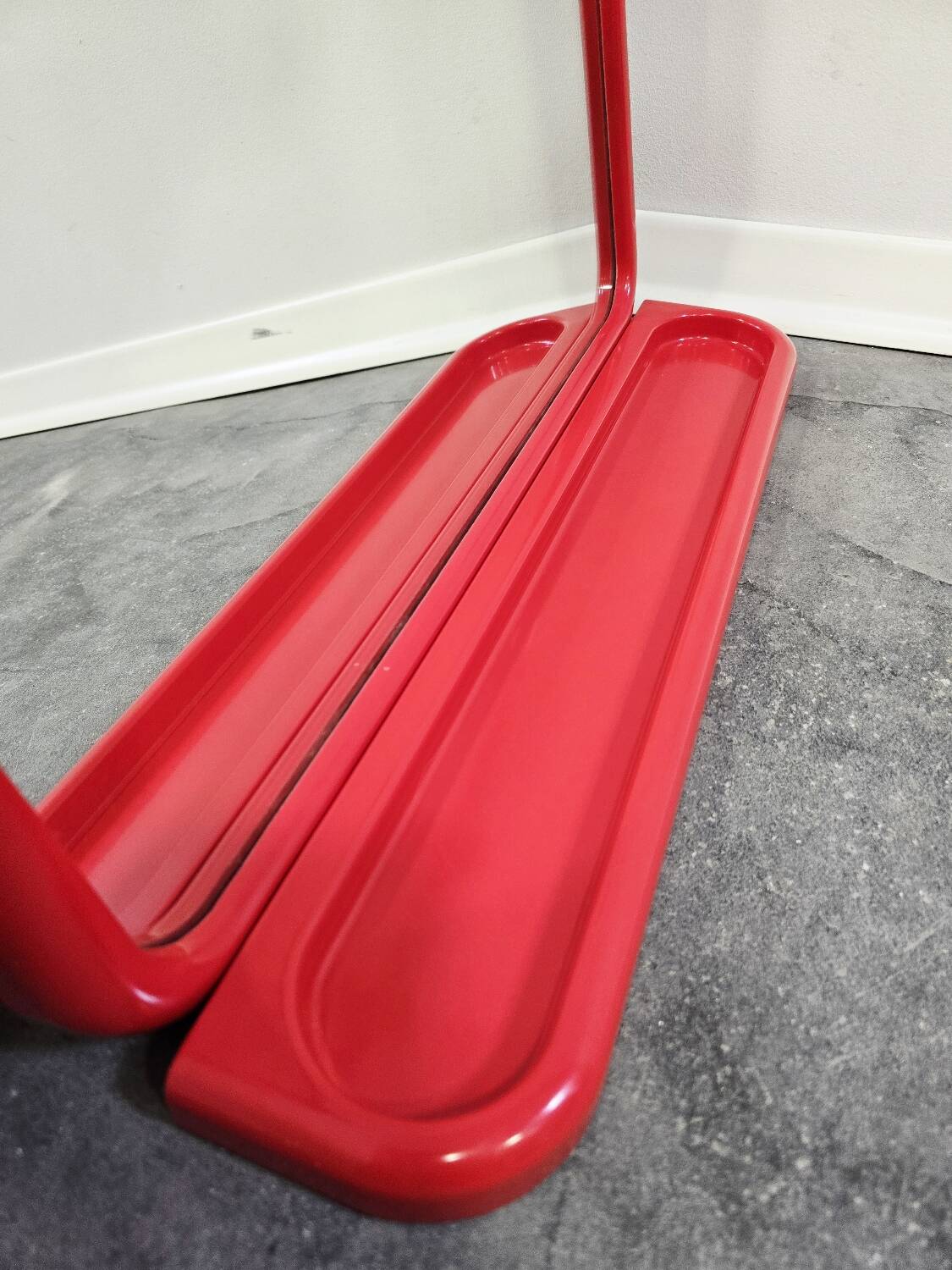 Mirror with a red shelf from the 90s.