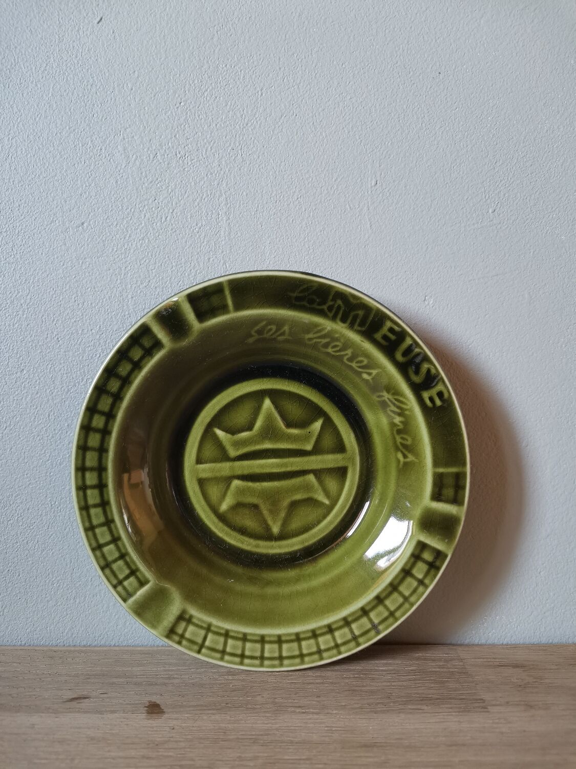 Green advertising ashtray in vintage slip from the Meuse its fine beers