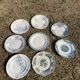 Set of 8 mismatched iron earth flat plates
