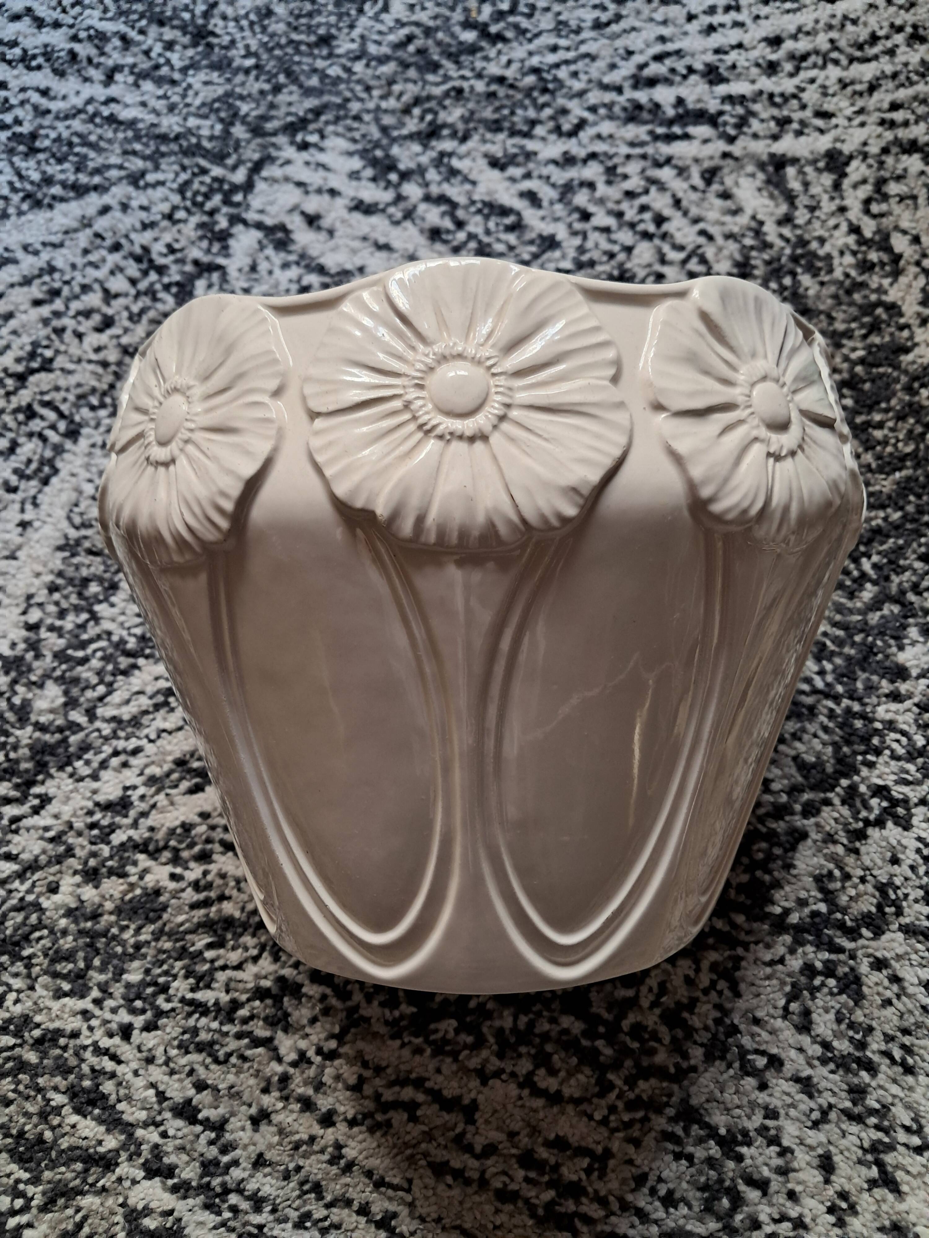 Vintage Art Nouveau ceramic with floral decoration.