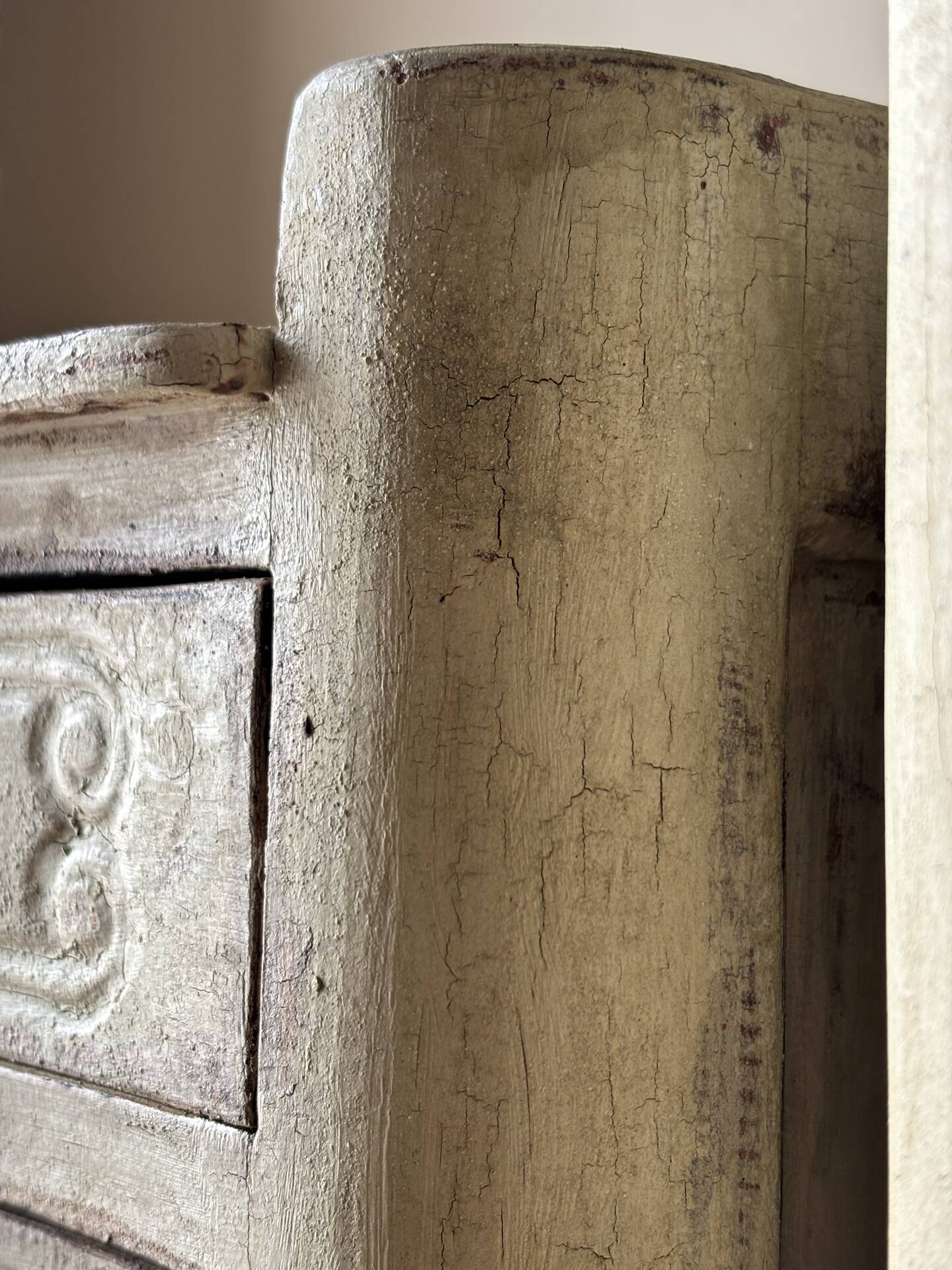A pair of distressed bedside tables.
