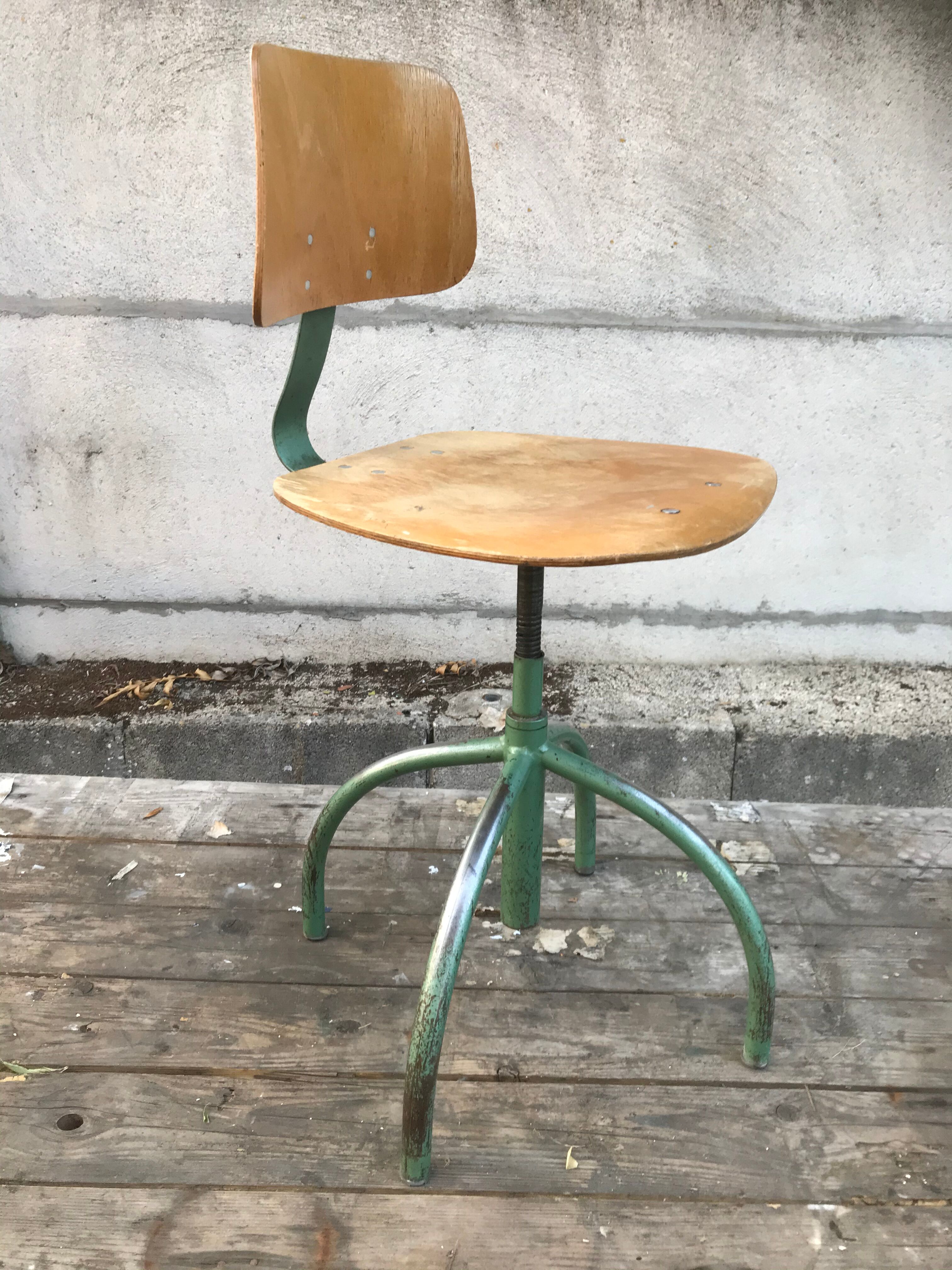 Former green metal workshop chair