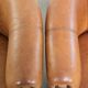Set of two vintage sheepskin club armchairs with a beautiful light colour