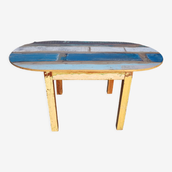 Table ovale en bois polychromé