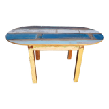Oval table in polychrome wood
