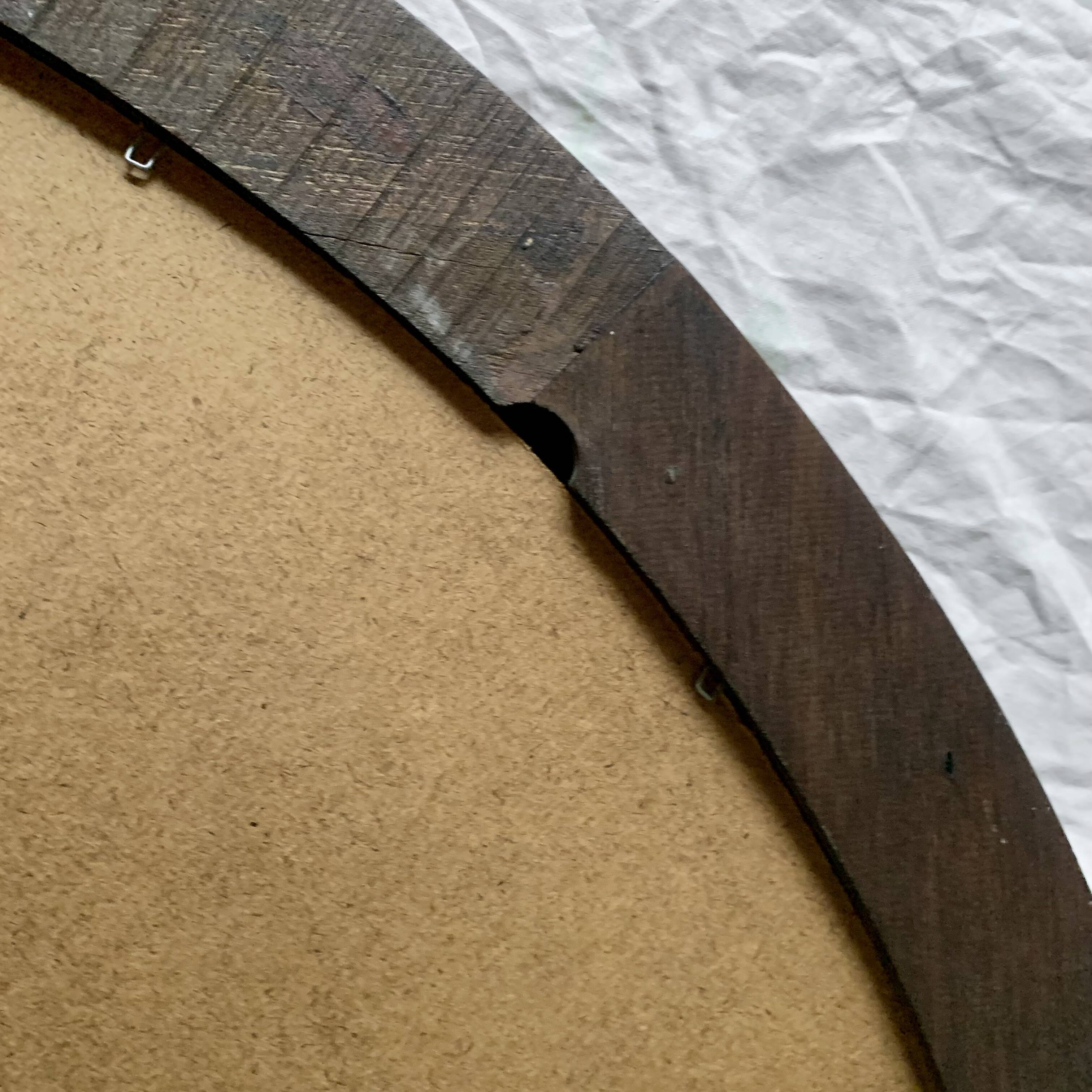 Old large oval wooden wall mirror