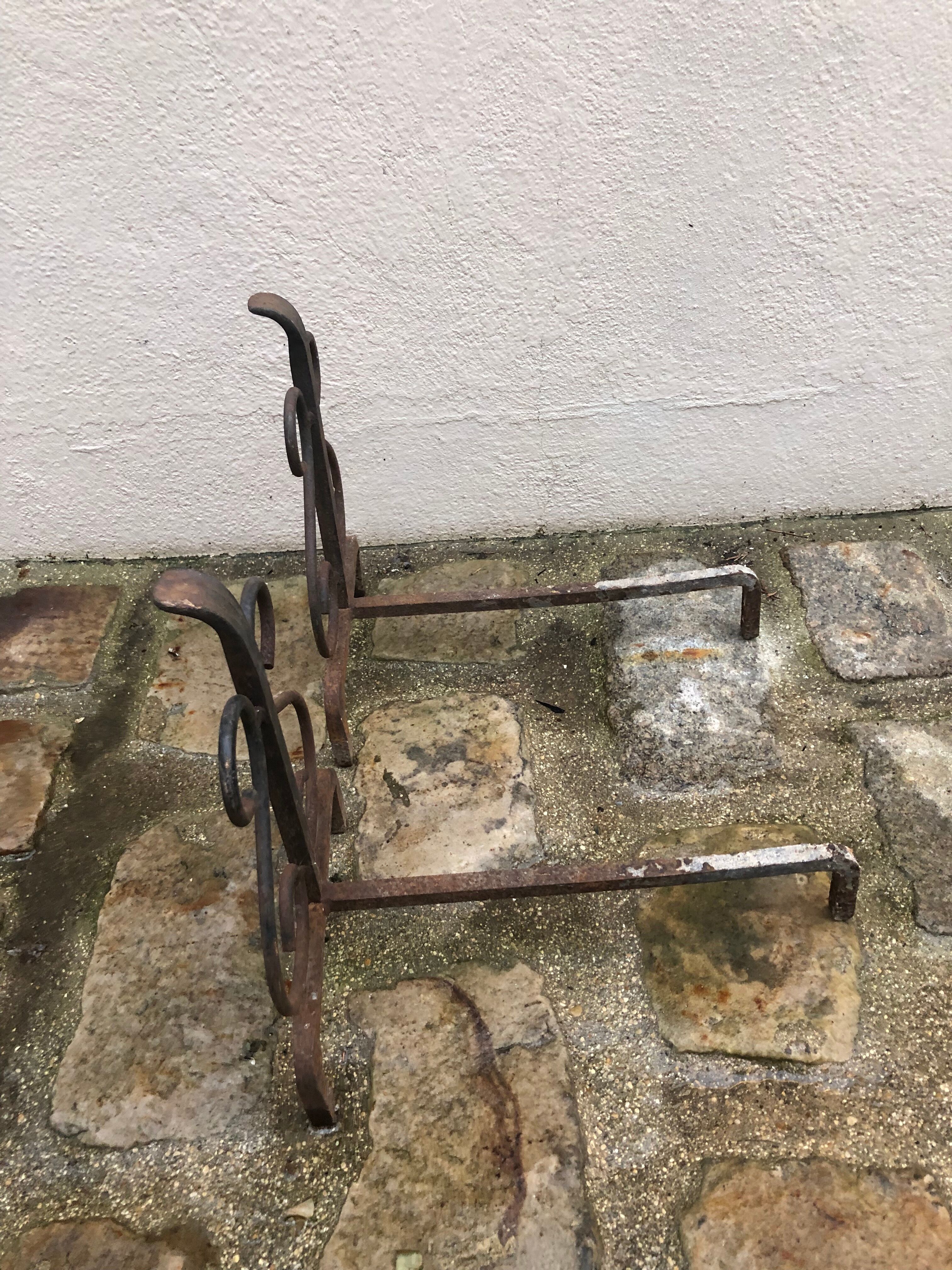 Pair of wrought iron pegs
