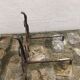 Pair of wrought iron pegs
