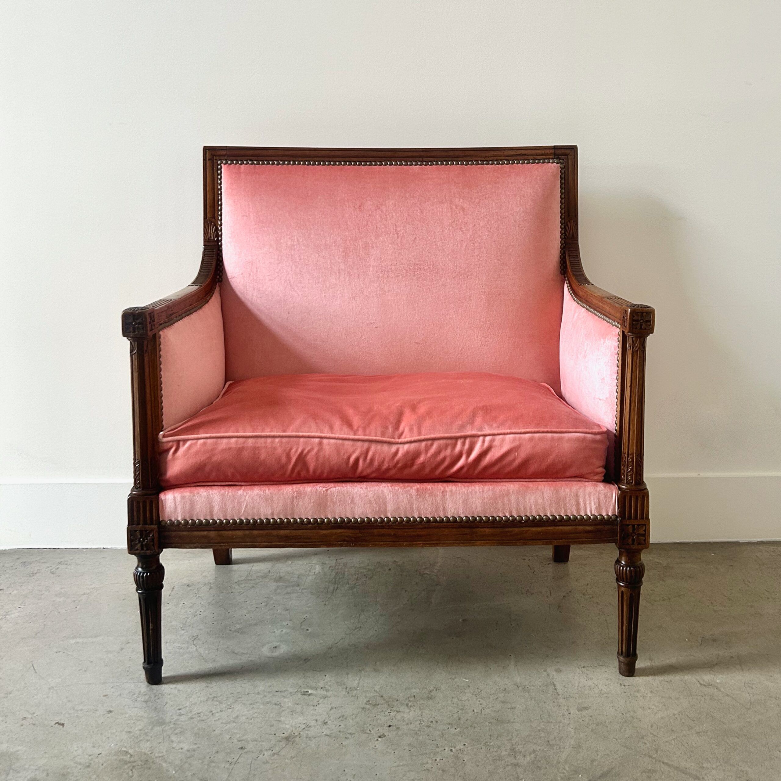 Large pink velvet armchair