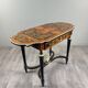 Writing table in Napoléon III style with marquetry and gilded bronzes, 19th century.