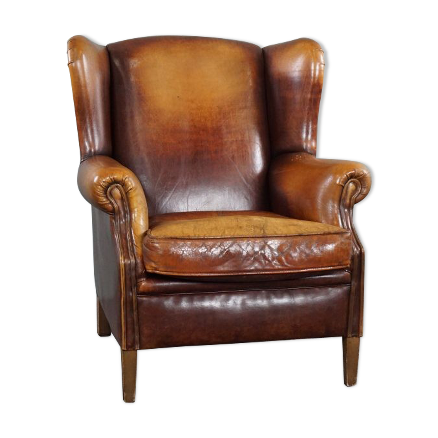 Armchair in patinated sheepskin leather