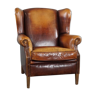 Armchair in patinated sheepskin leather