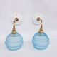 Vintage brass and blue glass wall lights
