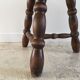 Tabouret en bois tourné tripode vintage