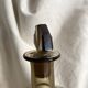 Art Deco smoked glass carafe with fan-shaped stopper.