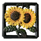 Cast iron trivet with sunflower decor