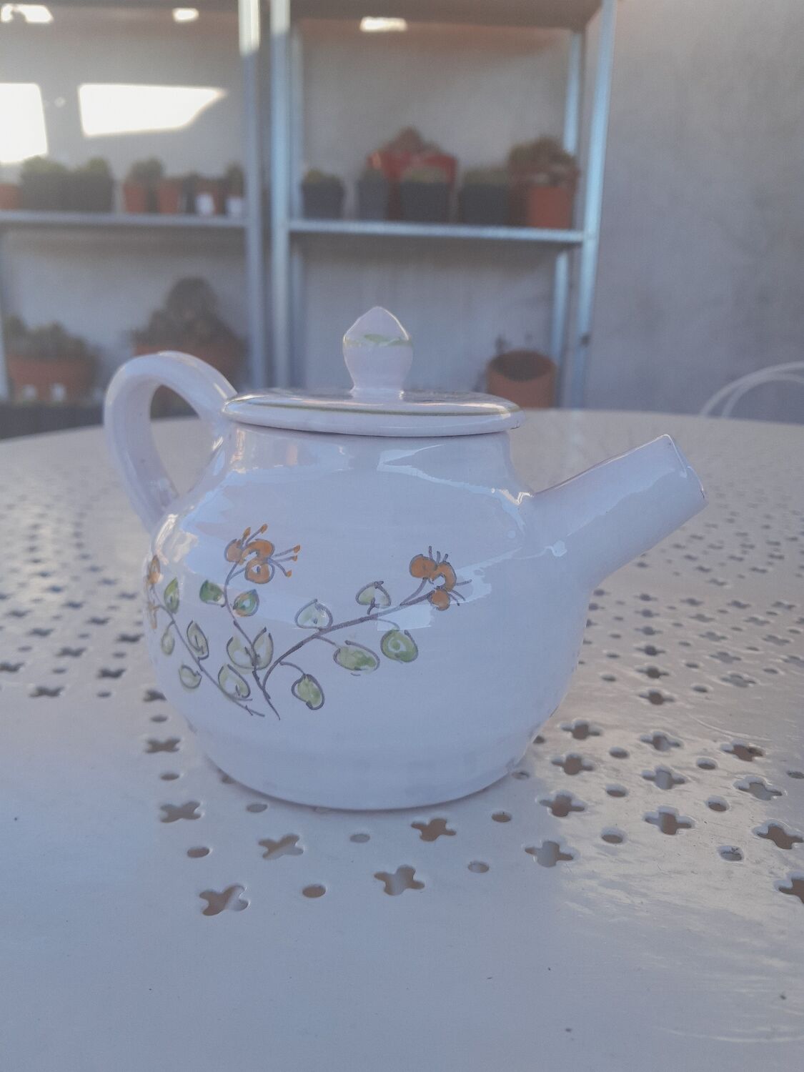 Artisanal glazed terracotta teapot