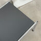 Table basse en métal chromé et mélaminé gris