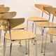 Thonet dining chairs stacked in chrome and beech
