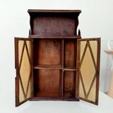 Small antique wall cabinet in Gothic style.