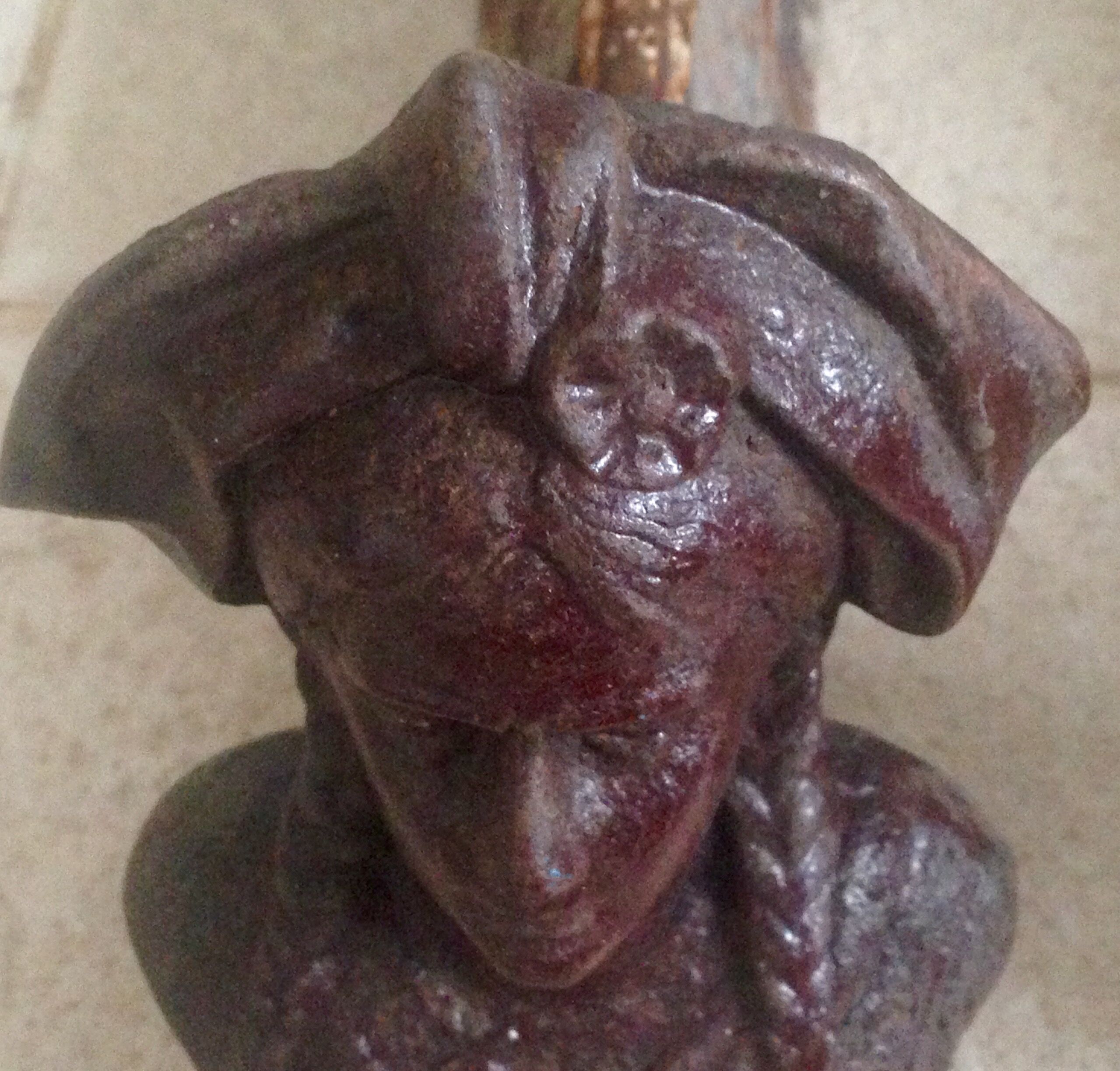 Pair of old andirons, Alsatian busts