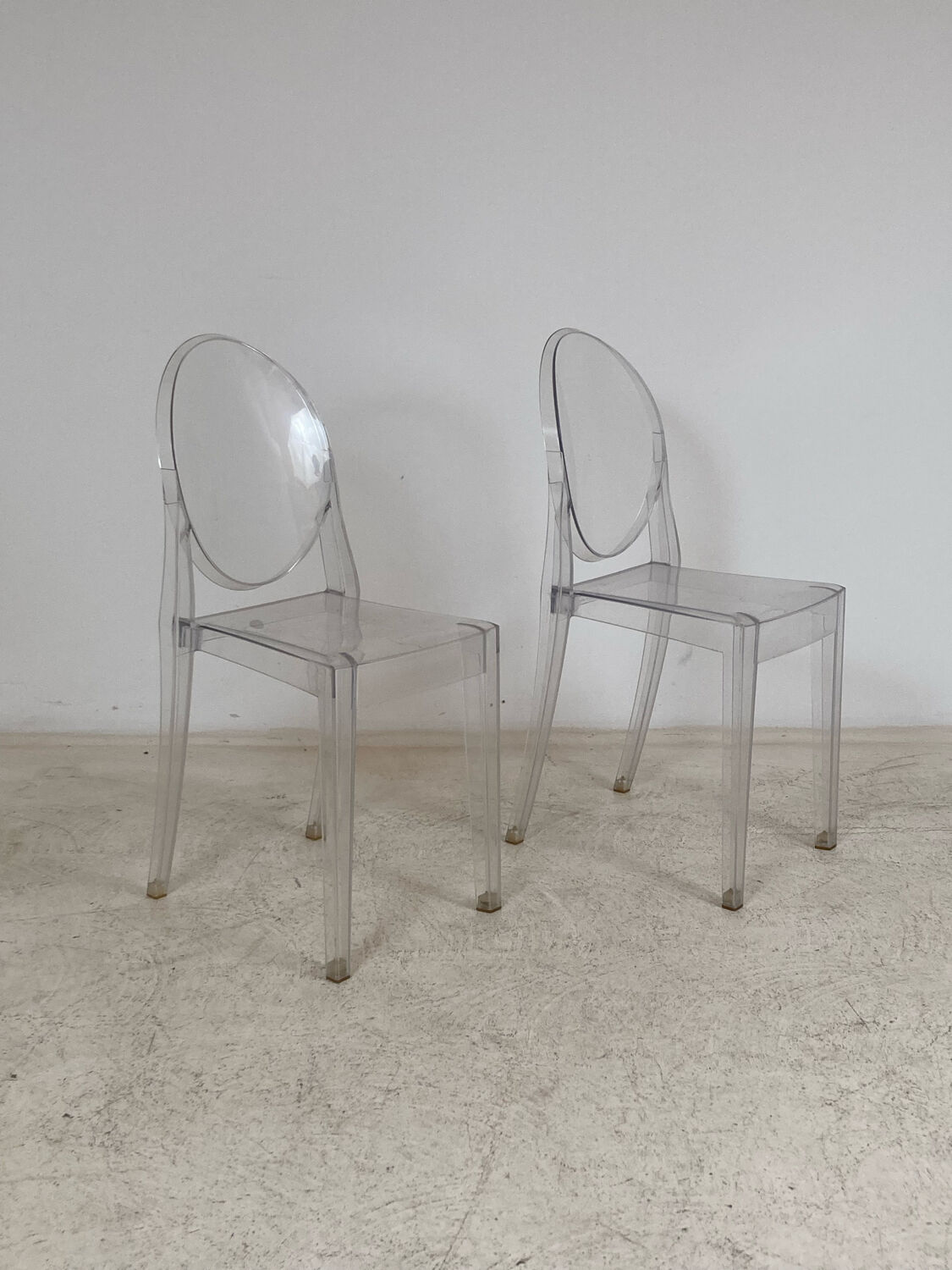 Pair of Victoria Ghost chairs by Philippe Starck Kartell edition