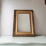 Beautiful French vintage mirror in gilded wood from the 60s