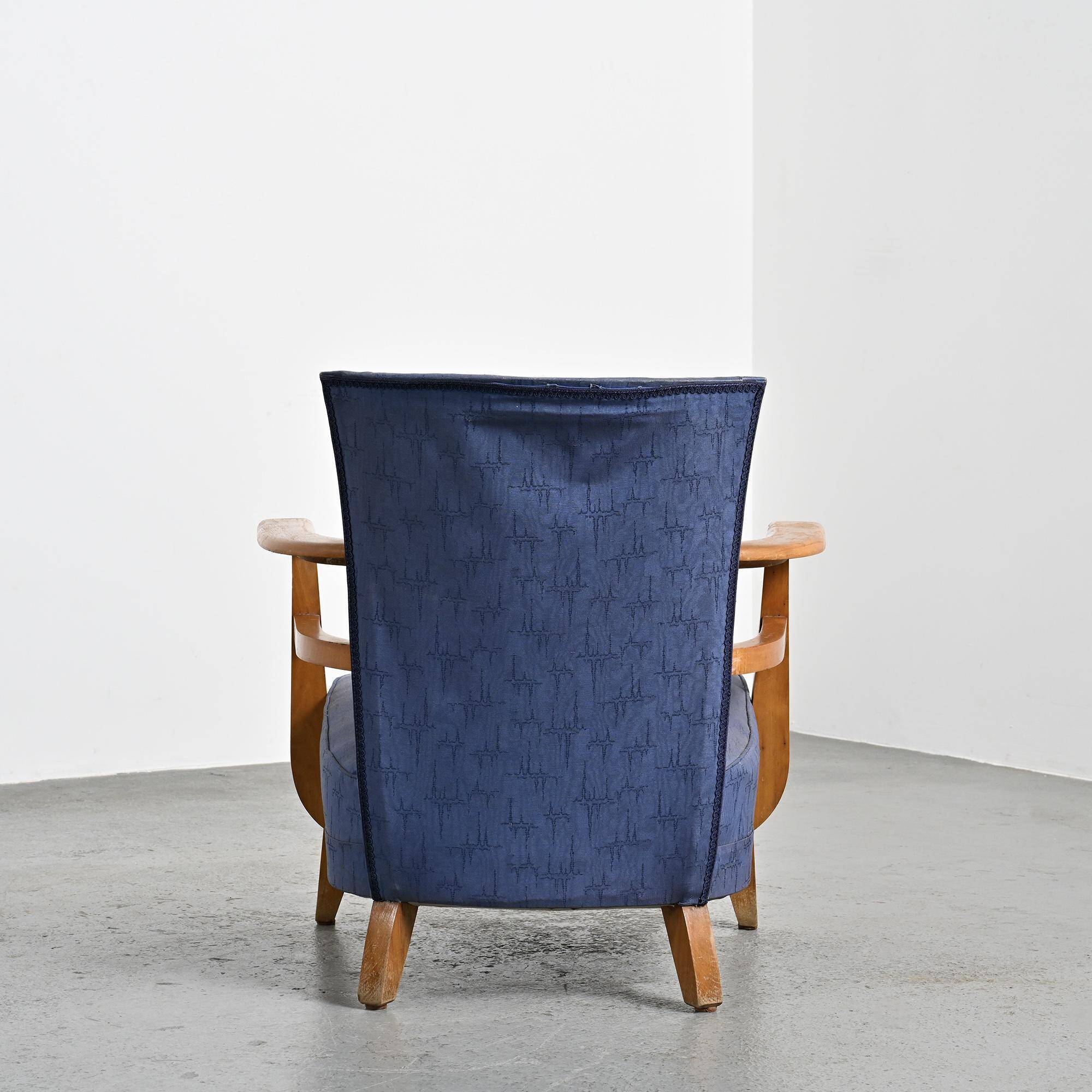Pair of living room armchairs in solid beech, France, circa 1950.