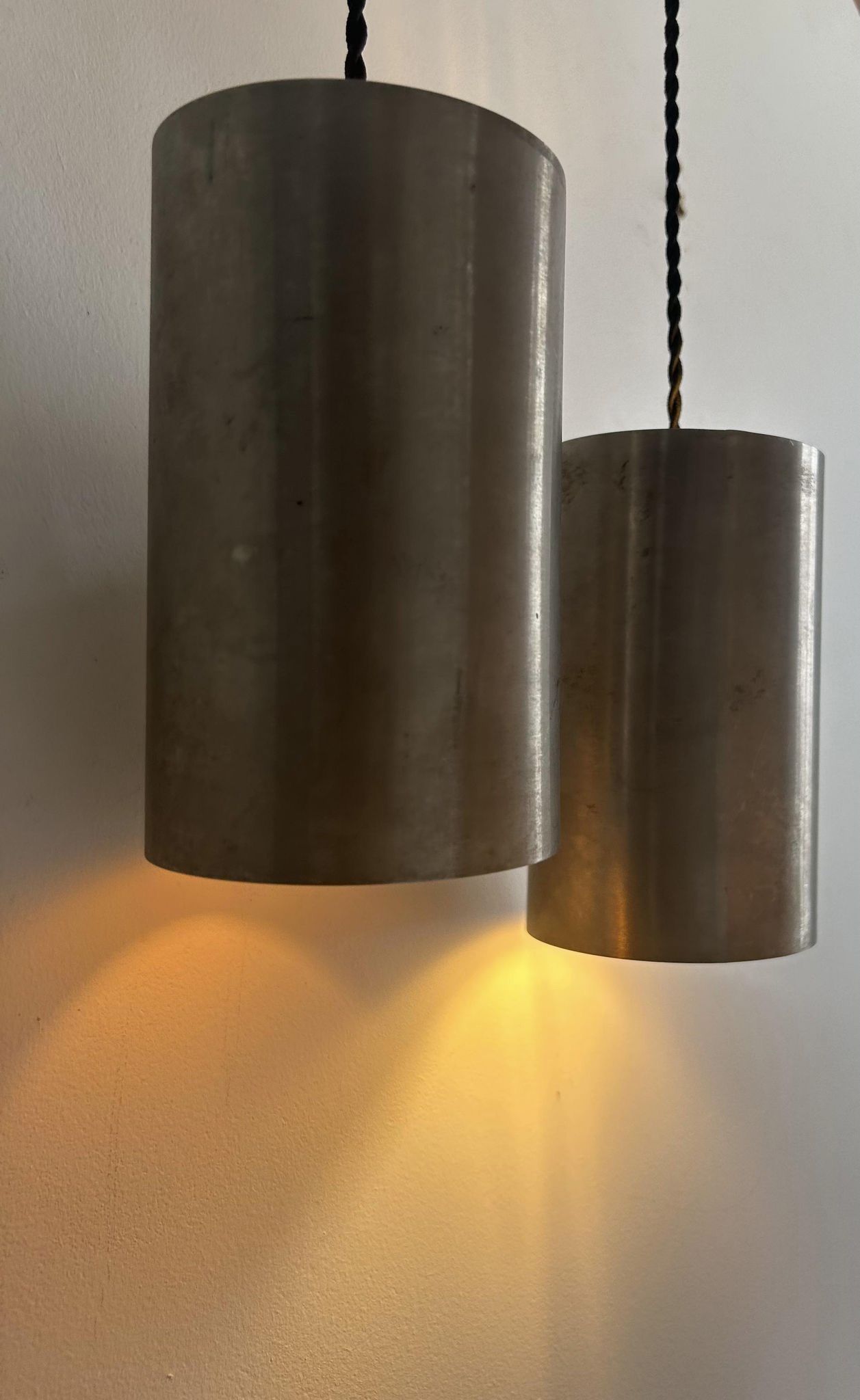 Pair of vintage brushed metal pendant lamps, France 1960
