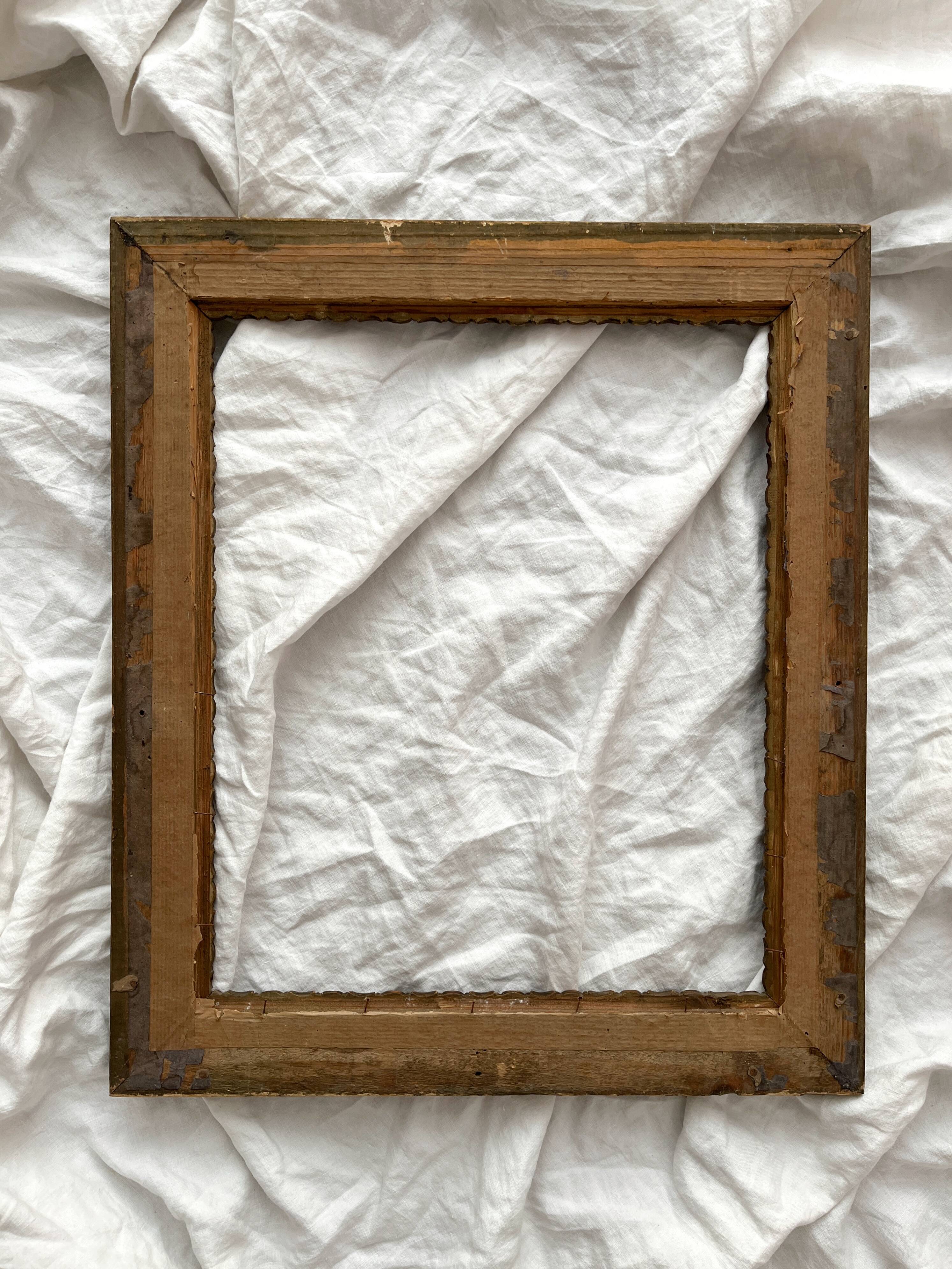 Old frame in gilded wood with stucco decoration circa 1900