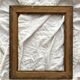 Old frame in gilded wood with stucco decoration circa 1900