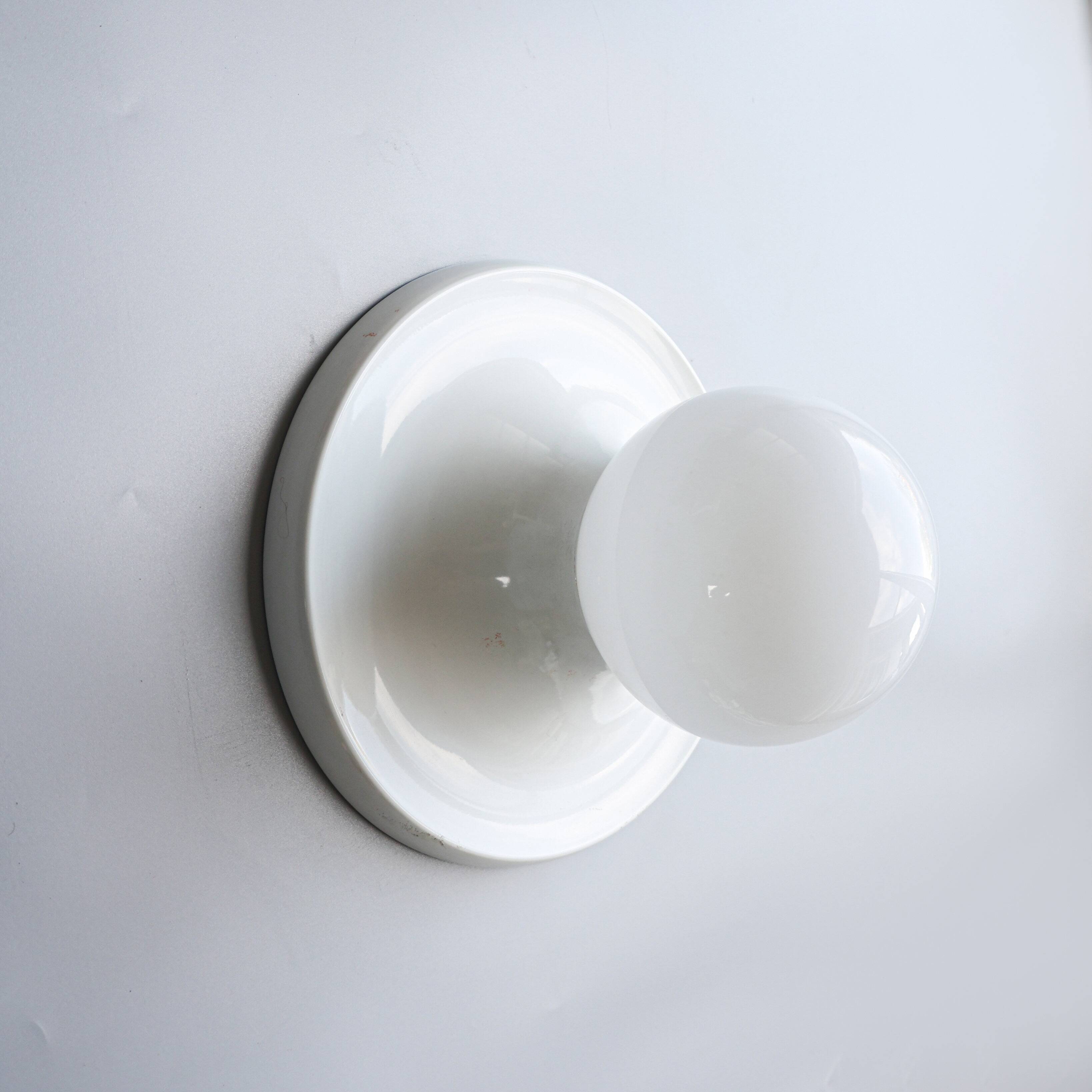 Light ball sconce by Achille & Pier Giacomo Castiglioni, 1970s, Italy.