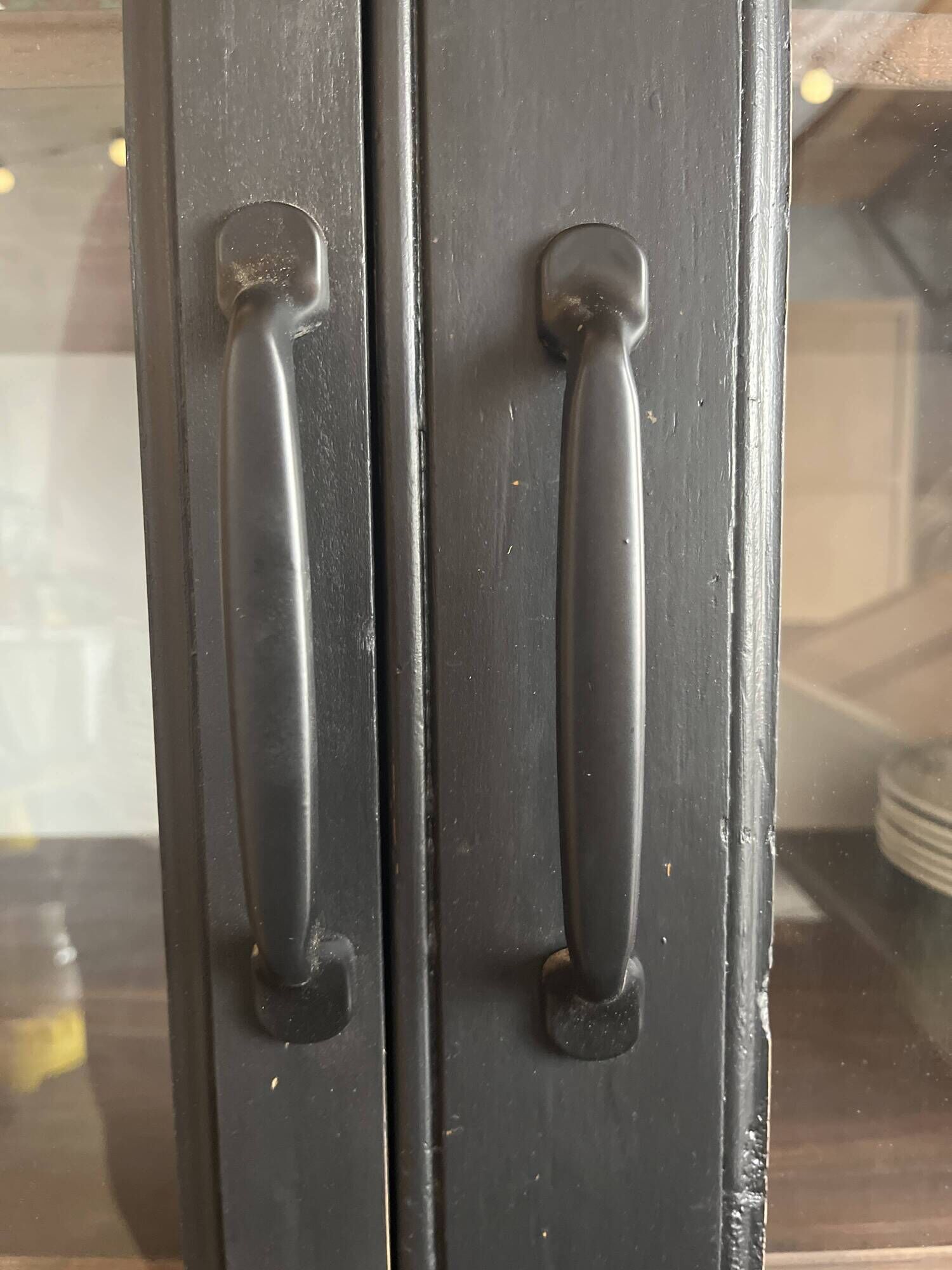 Aged patinated black display cabinet