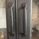 Aged patinated black display cabinet