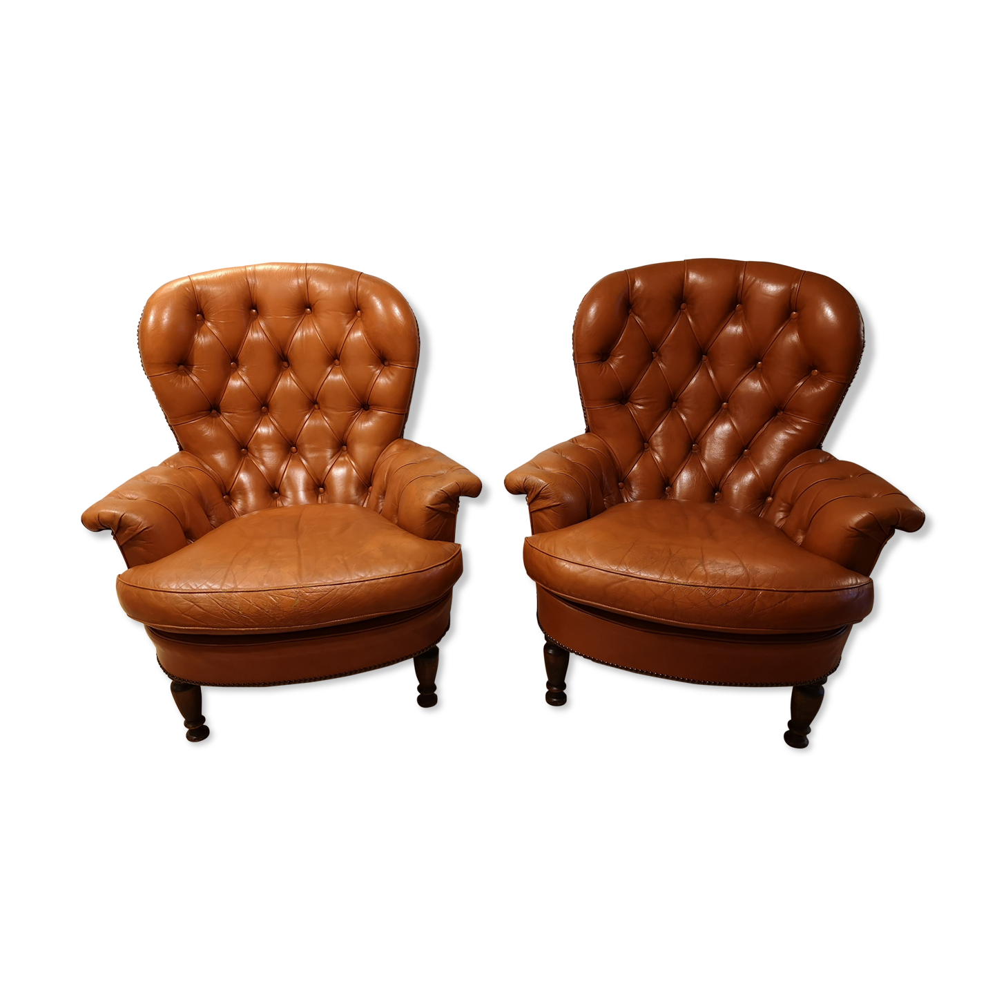 Pair of leather chesterfield chairs