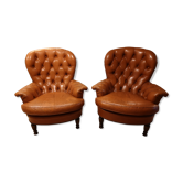 Paire de fauteuils chesterfield en cuir