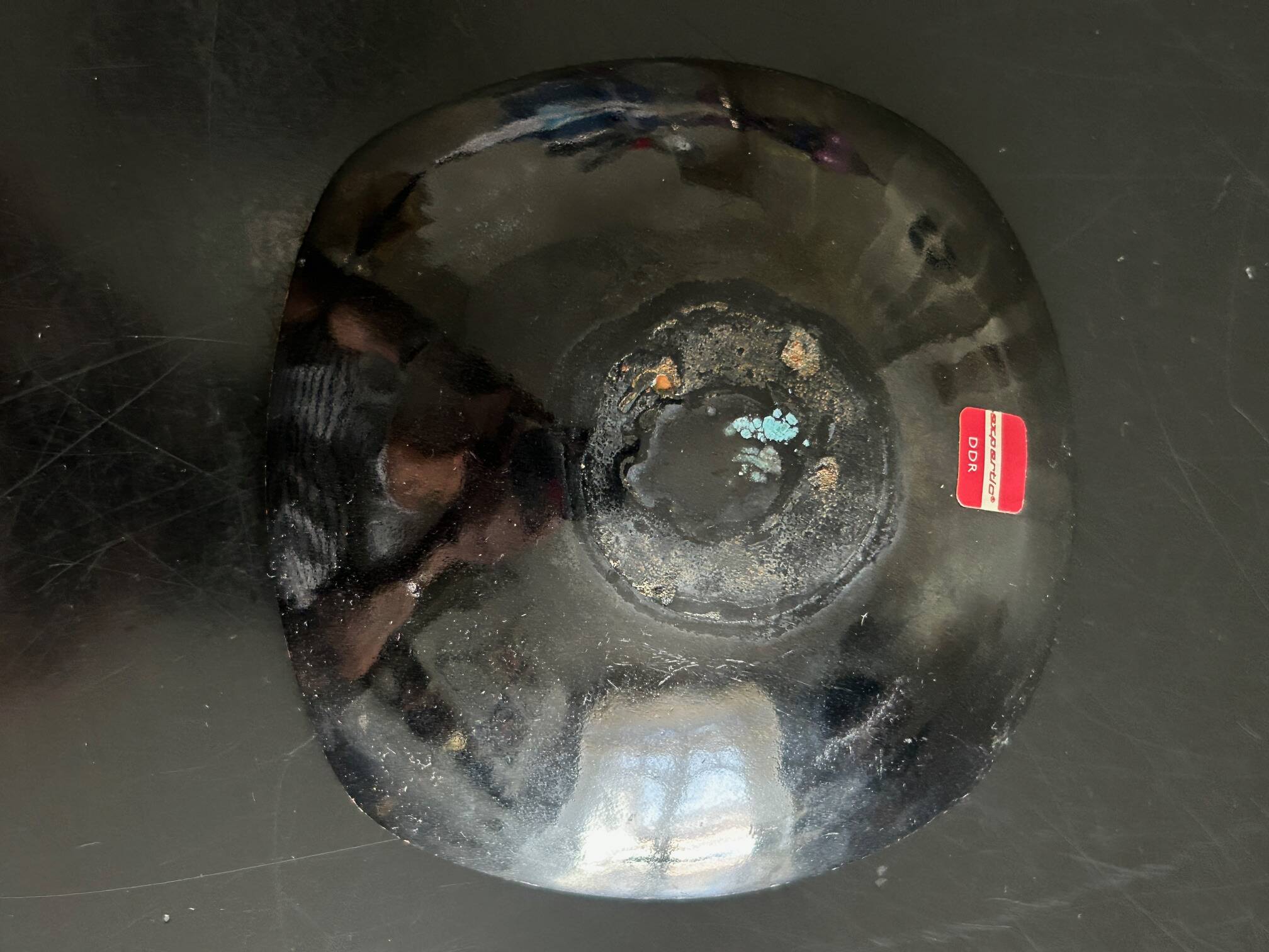 Expertic enamelled brass pocket emptier