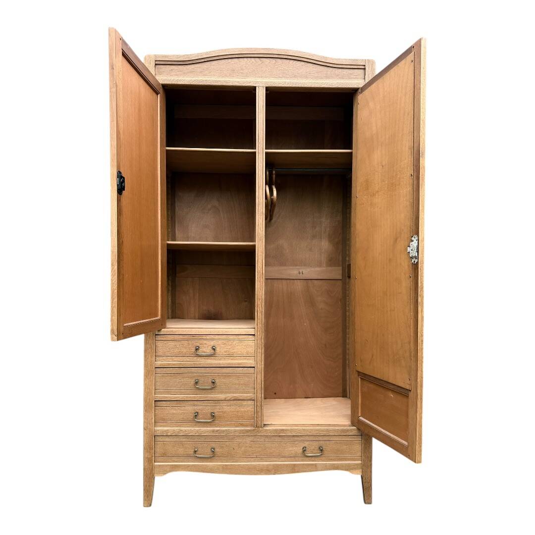 Parisian hotel wardrobe with bevelled mirror, solid raw oak, 1920.
