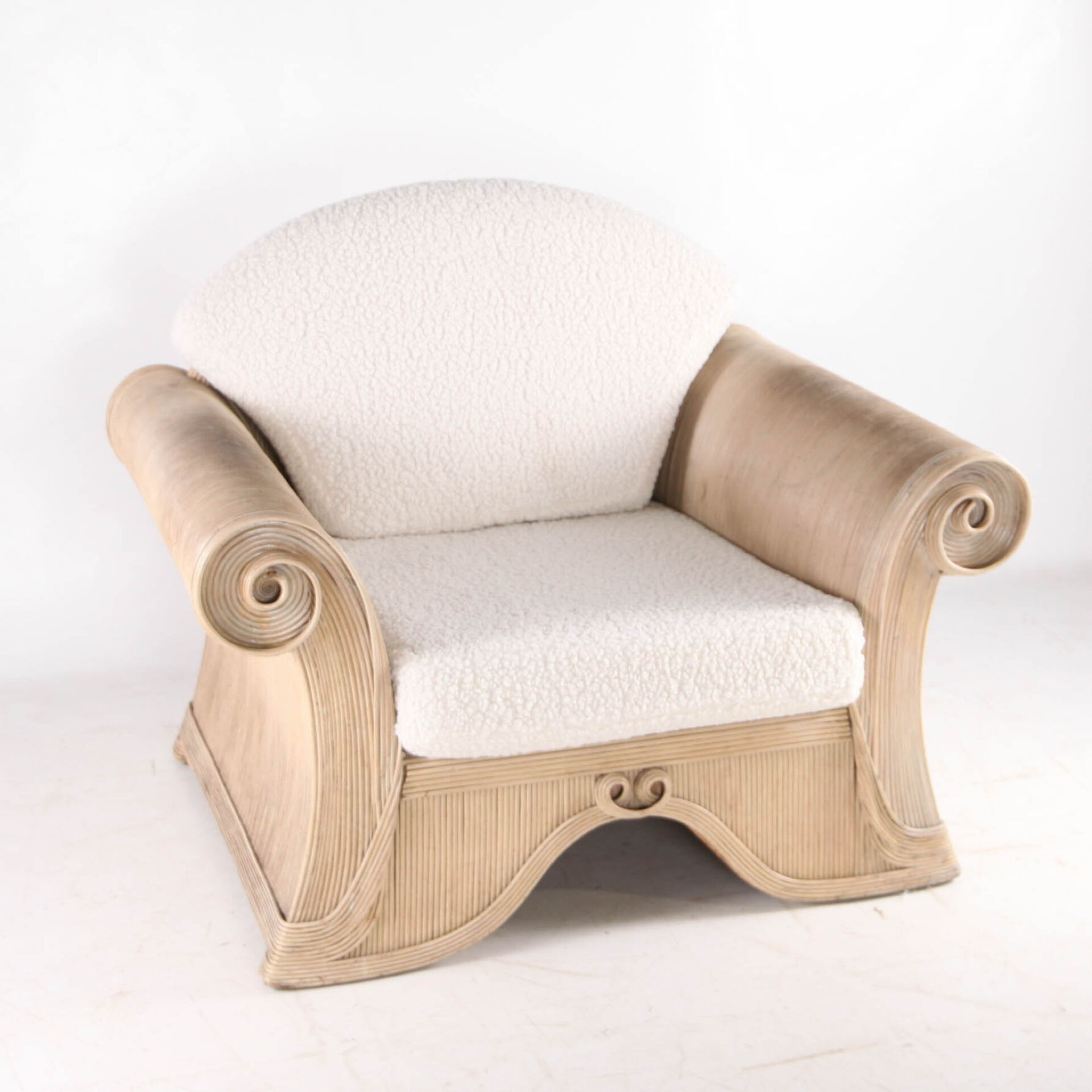 Rattan armchair by Betty Cobonpue