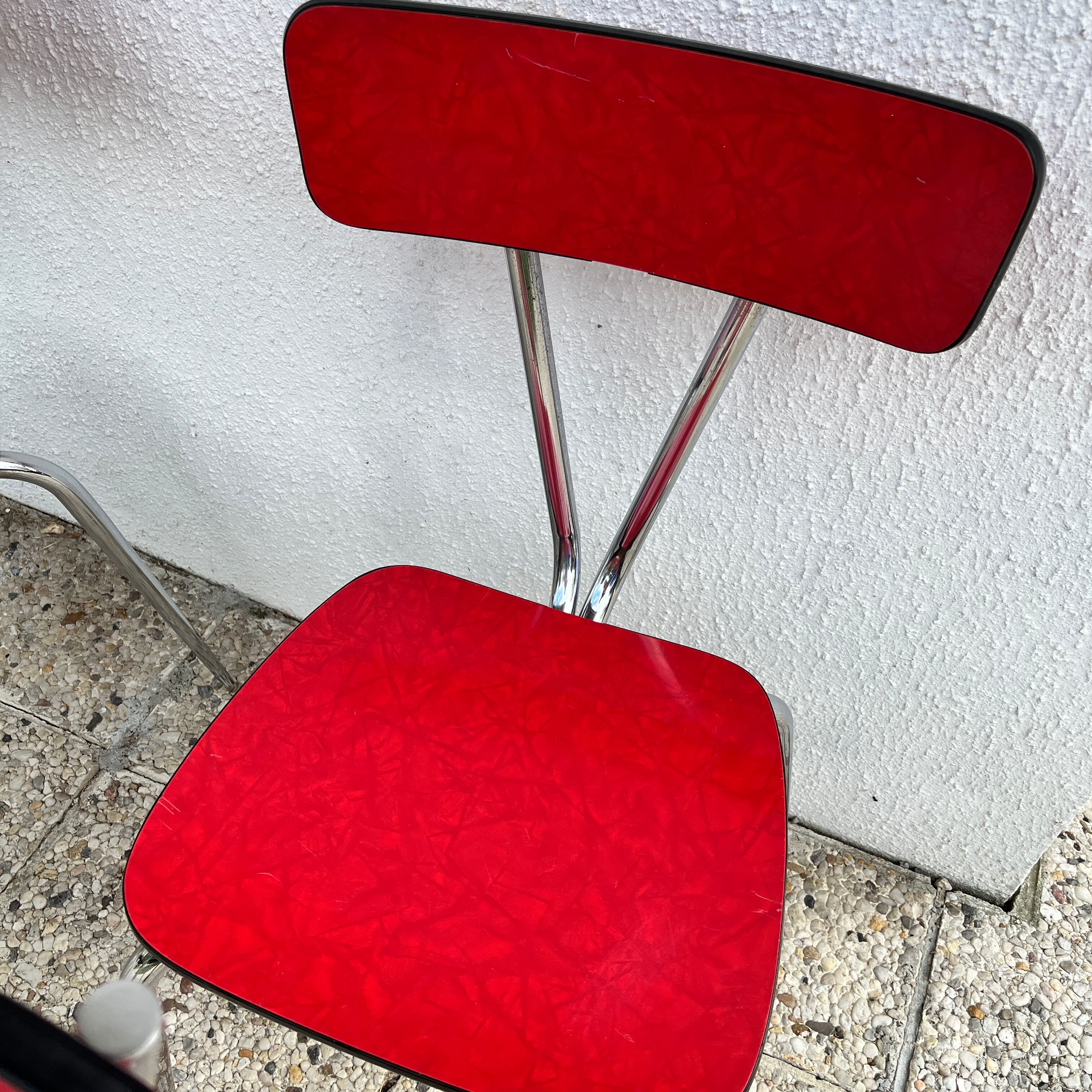Chairs in formica red foot compass