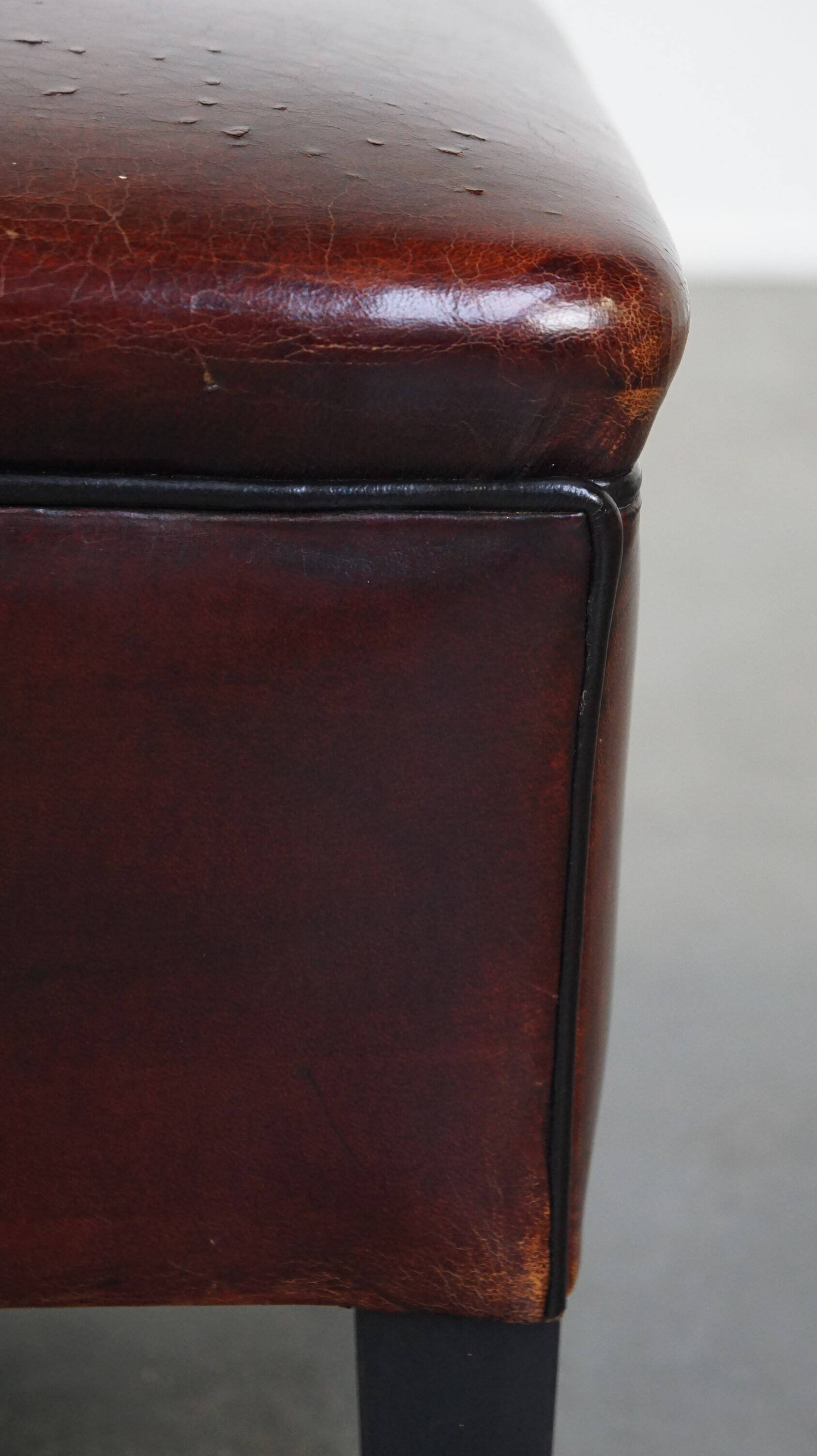 Large square sheepskin leather ottoman with a beautiful patina