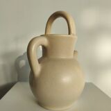 Pitcher ball in sandstone with floral pattern