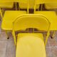 Ensemble de six chaises en métal pliantes jaunes Eurosit