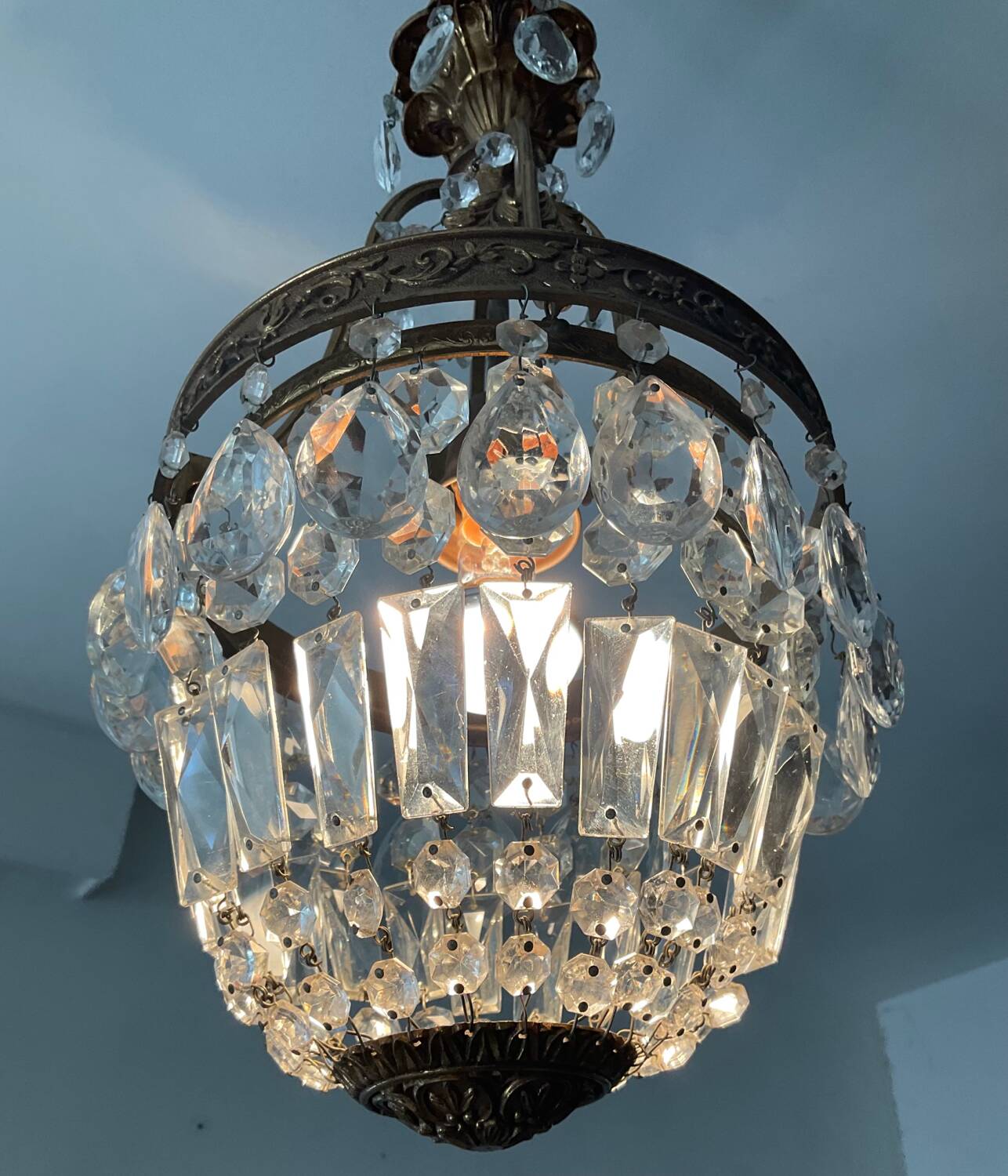 Old bronze basket chandelier with tassels