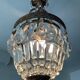 Old bronze basket chandelier with tassels