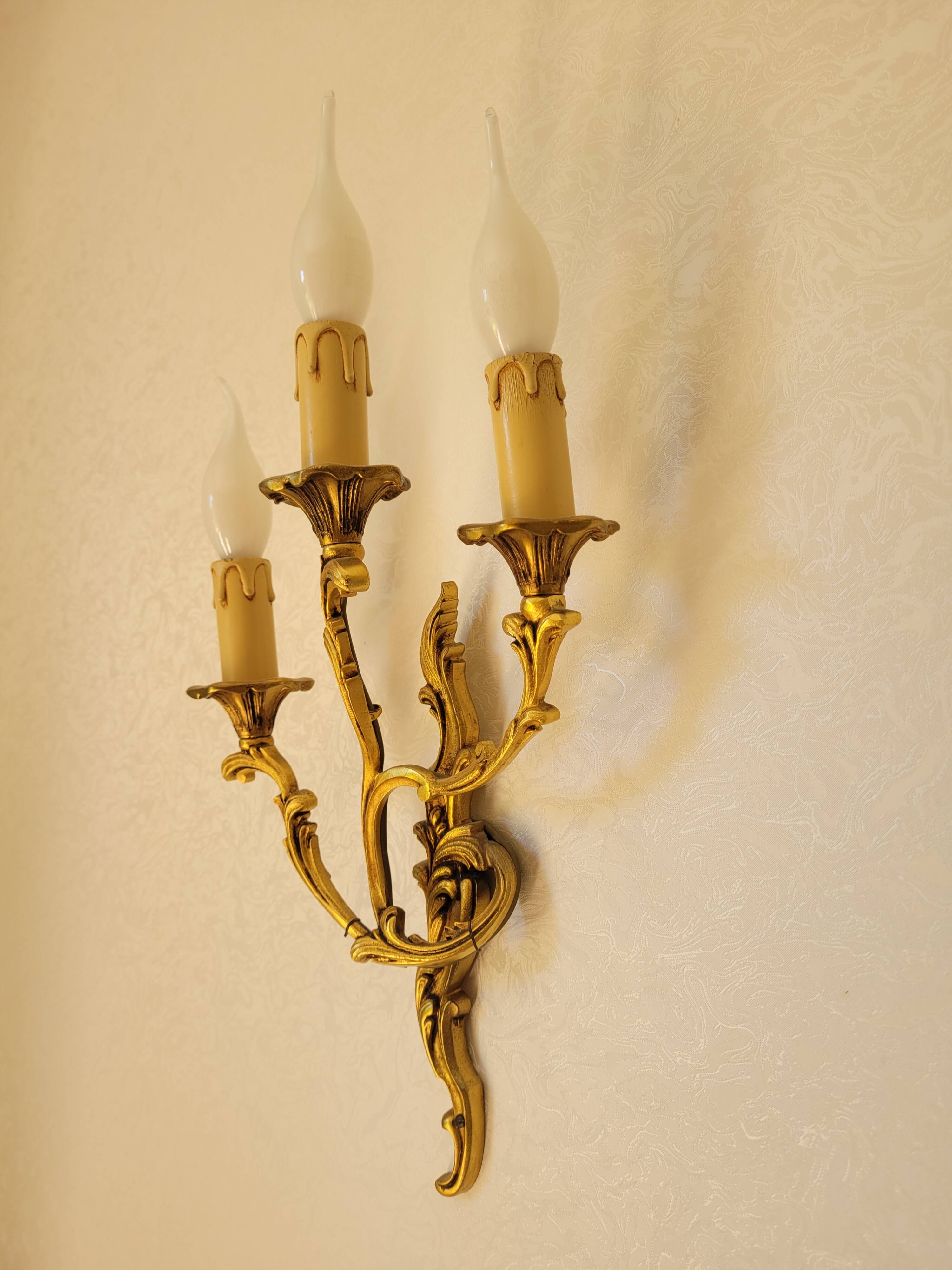 2 gilded bronze wall lights