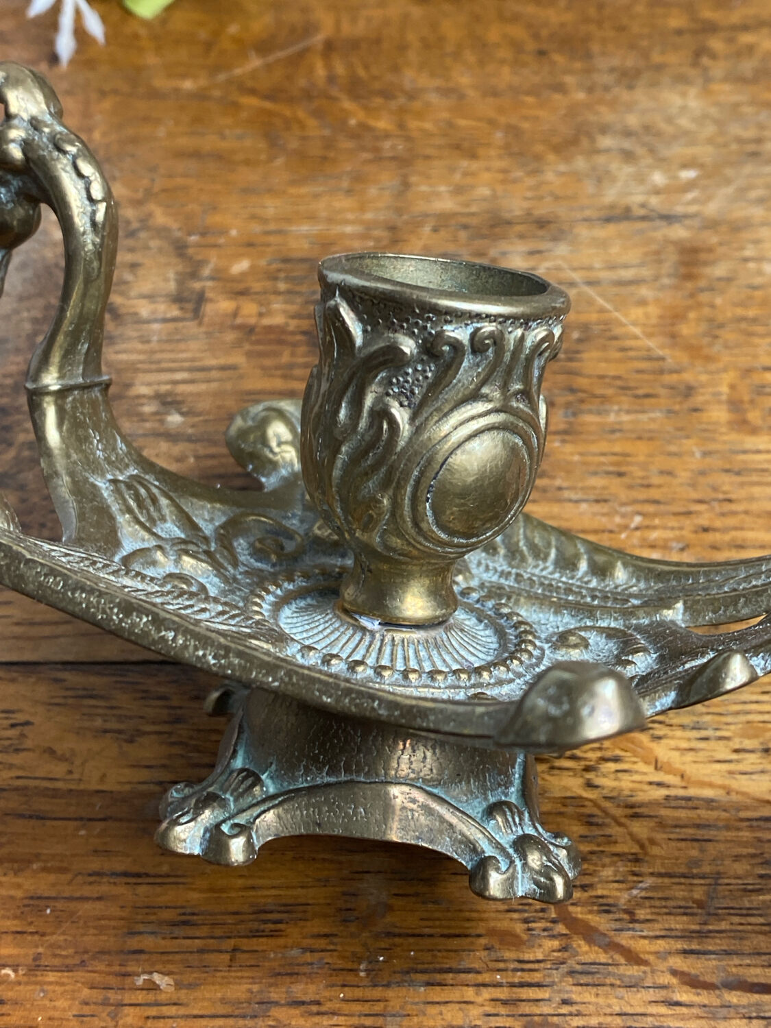 Hand candlestick, peacock shape, in bronze