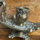 Hand candlestick, peacock shape, in bronze